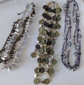 Three Multi Strand Necklaces.